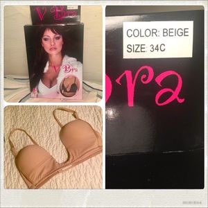 Never worn. V Bra Nude 34 C w/convertible straps